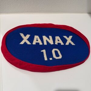 Jonathan Adler Xanax Pill Blue and Red Oval Pillow cover